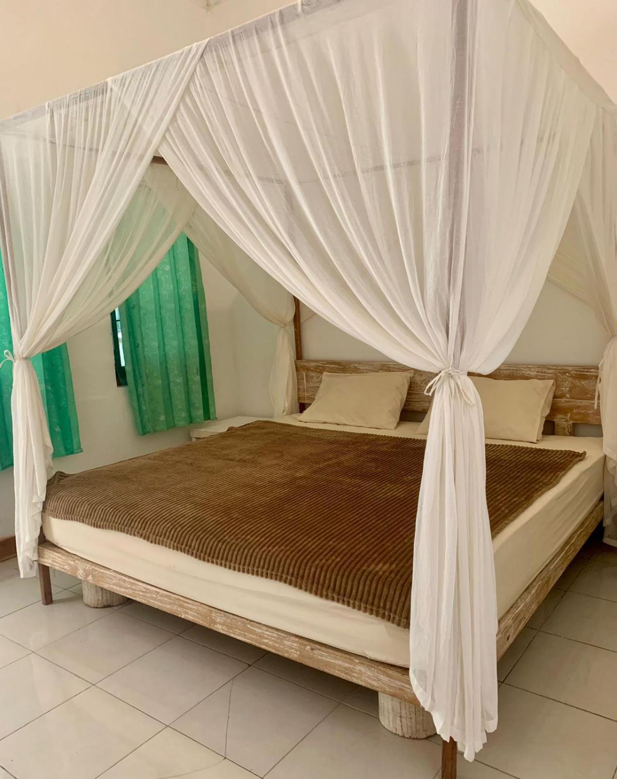 The Village Rua Beach Homestay Exterior foto